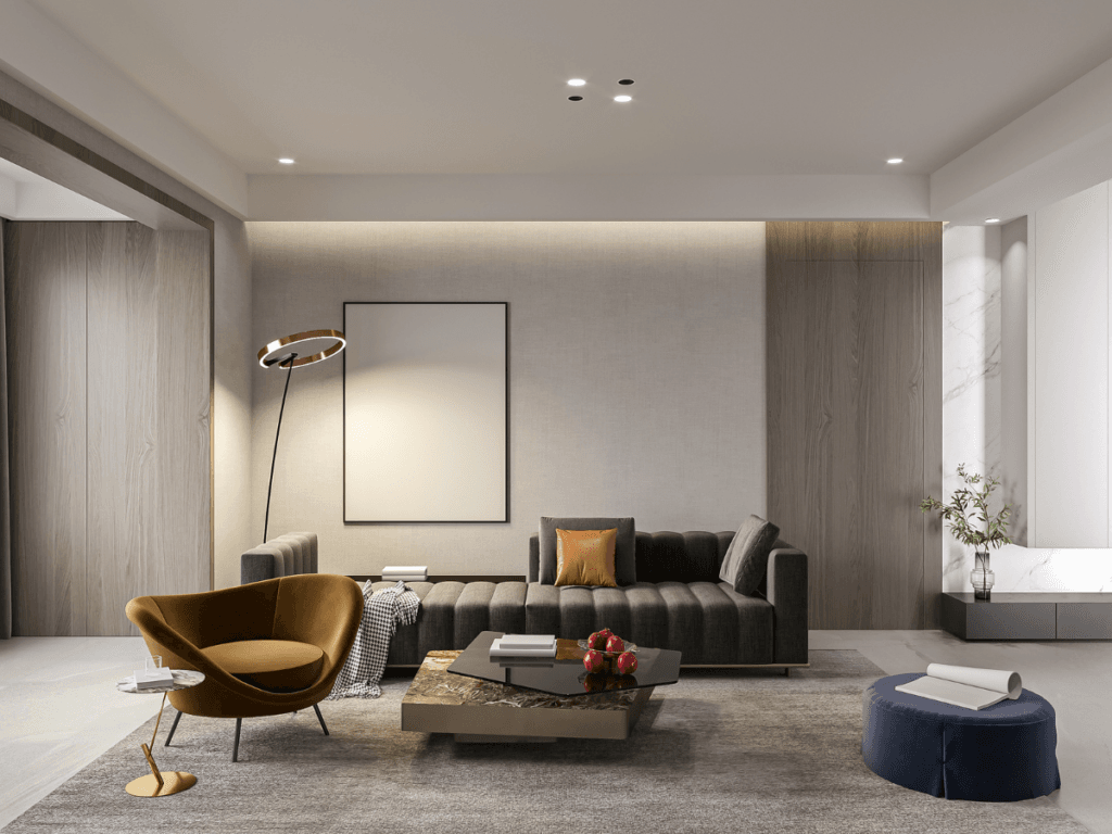 Modern living room with a dark sofa, brown accent chair, geometric coffee table, and wall art in neutral tones—see our carpet flooring padding guide for tips on selecting comfort and style for your minimalistic décor.